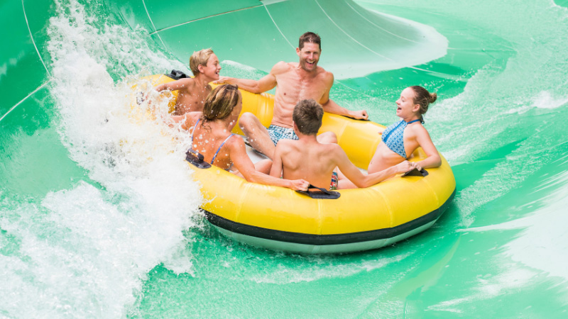 Riders Having Fun and  Laughing On Coaster